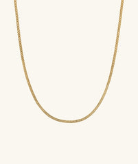 Timepiece Chain Necklace: A sleek, handcrafted 14k gold chain necklace displayed on a white background, exemplifying minimalist elegance and everyday wearability.
