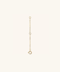 Gold Chain Double Extender featuring circular links, shown in close-up, designed to add length and versatility to your jewelry styling.