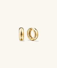 Plush Small Hoops, handcrafted 14k gold, perfectly pillowy design, displayed as a pair of gold hoop earrings. Ideal for those seeking a bold accessory.