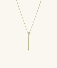 Celeste Lab Grown Diamond Lariat Necklace featuring a gold chain with a cluster of diamonds and a drop chain diamond pendant.
