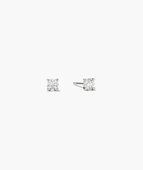 Large Diamond Studs with a unique diamond setting, showcasing a close-up view of the intricate craftsmanship and timeless design of these handcrafted earrings.