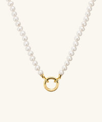 Pearl Necklace With Vermeil Enhancer: A handcrafted necklace featuring a gold vermeil ring and responsibly sourced freshwater pearls, perfect for customizable charm wear.