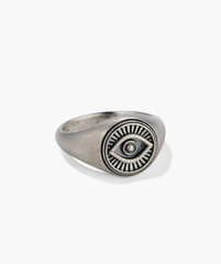 Courage Signet Ring: Silver ring featuring a central eye design, symbolizing protection against envy and evil.
