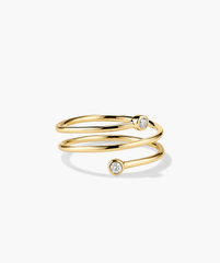 Diamond Coil Ring: Handcrafted 14k gold ring featuring responsibly sourced pavé diamonds, designed to give the appearance of multiple rings in one.