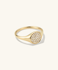 Pavé Diamond Signet Pinky Ring featuring a gold band adorned with sparkling diamonds, exemplifying elegance in a compact design.