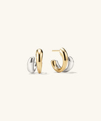 Jojo Double Hoops featuring a mixed metal design with an optical illusion effect, showcasing a unique twist on classic hoop earrings.
