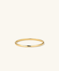 Stacker Ring: A sleek, minimalist gold ring, ideal for daily wear and versatile styling. Perfect as a starter piece or addition to any collection.