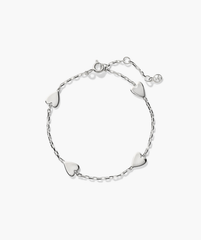 Heart Station Bracelet: A silver bracelet adorned with multiple heart-shaped charms.