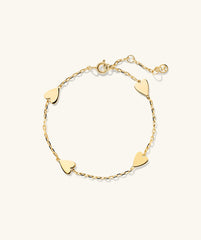 Heart Station Bracelet featuring gold hearts linked together, creating a delicate and stylish fashion accessory perfect for any occasion.