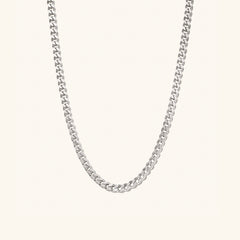 5mm Curb Chain Necklace: A sleek silver chain, perfect for everyday wear, styled solo or layered for a statement.