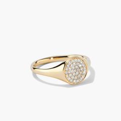 Pavé Diamond Signet Pinky Ring featuring intricate gold craftsmanship adorned with sparkling diamonds, highlighting its elegant design and luxurious appeal.
