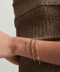Multi Gemstone Station Bracelet shown on a woman's wrist, featuring a delicate design with colorful gems set in 14k solid gold.