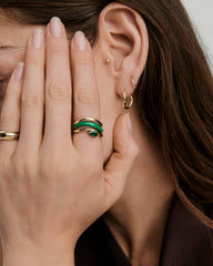 Dôme Figure Balance Ring with a pear cut gemstone floating above the band, ideal for layering with other Dôme Figure Rings.