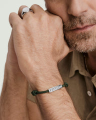 Colosseum Cord Bracelet featuring a striking metal and cord design from the Charlotte collection, ideal for adventurous journeys.