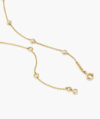 Lab Grown Sapphire Orbit Necklace with five round bezel-set stones on a delicate chain, featuring a spring-ring clasp and MEJURI tag.