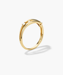 Open Dôme Diamond Ring with a slim polished band, set with three round diamonds in 14k responsibly sourced Salmon Gold, showcasing delicate craftsmanship.