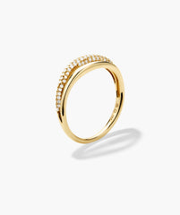 Open Dôme Pavé Ring features a curved 14K yellow-gold band with sparkling pavé-set diamonds, showcasing a harmonious blend of texture and elegance.