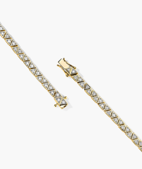 Patra Diamond Tennis Bracelet: A close-up of a handcrafted 14k gold bracelet adorned with responsibly sourced diamonds.
