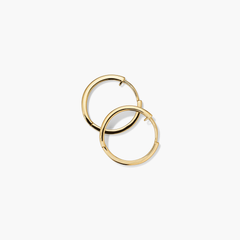 Easy Small Hoops: Handcrafted 14k gold hollow hoop earrings with a clicker closure, designed for everyday comfort and effortless wear.