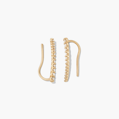 Pavé Diamond Climbers: A pair of 14k solid gold earrings adorned with pavé diamonds designed to enhance ear real estate elegantly, suitable for single or multiple piercings.