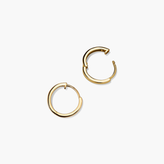 Easy Huggie Hoops: Handcrafted 14k gold hoop earrings with a clicker closure for comfort and security. Perfect for daily wear.