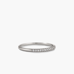 Diamonds Team Ring: A silver ring with diamonds, perfect for pairing with Stacker Rings to elevate any outfit.