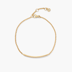 Pave Diamond Bar Bracelet featuring a sleek gold chain and secure clasp, highlighted by a central gold bar adorned with pave diamonds.