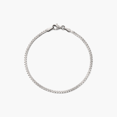 Serpentine Chain Bracelet with flat, braided links and a clasp, designed for comfortable all-day wear.