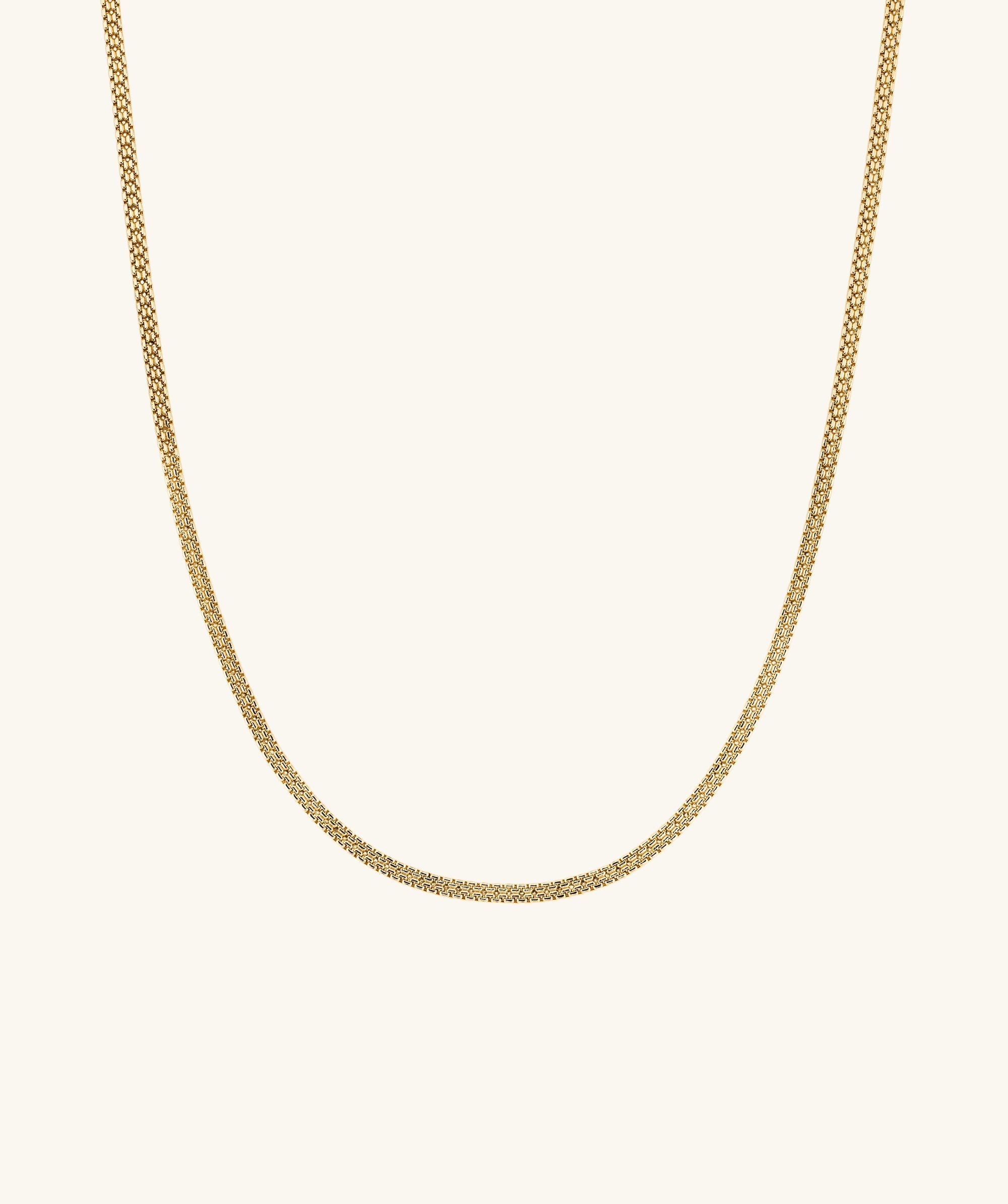 Timepiece Chain Necklace: A sleek, handcrafted 14k gold chain necklace displayed on a white background, exemplifying minimalist elegance and everyday wearability.