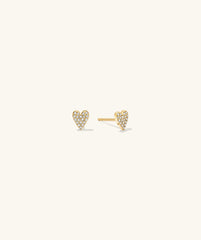 Mini Heart PavÃ© Diamond Stud Earrings: A pair of 14k solid gold heart-shaped earrings adorned with pavÃ© diamonds. Handcrafted, playful, and elegant statement pieces.