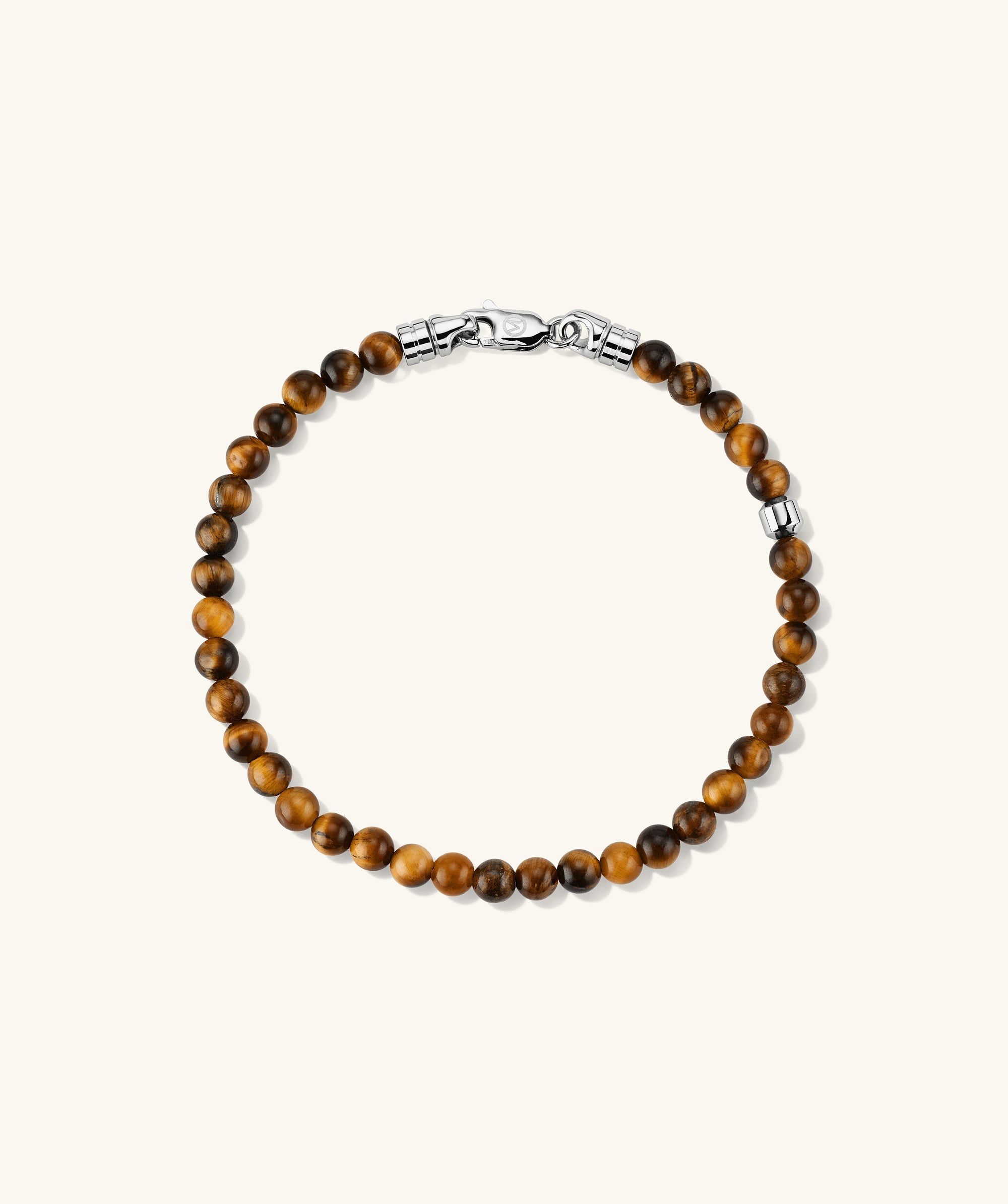 4mm Gemstone Beaded Bracelet featuring brown beads and a sterling silver swivel clasp, adding texture and shape to your everyday style.