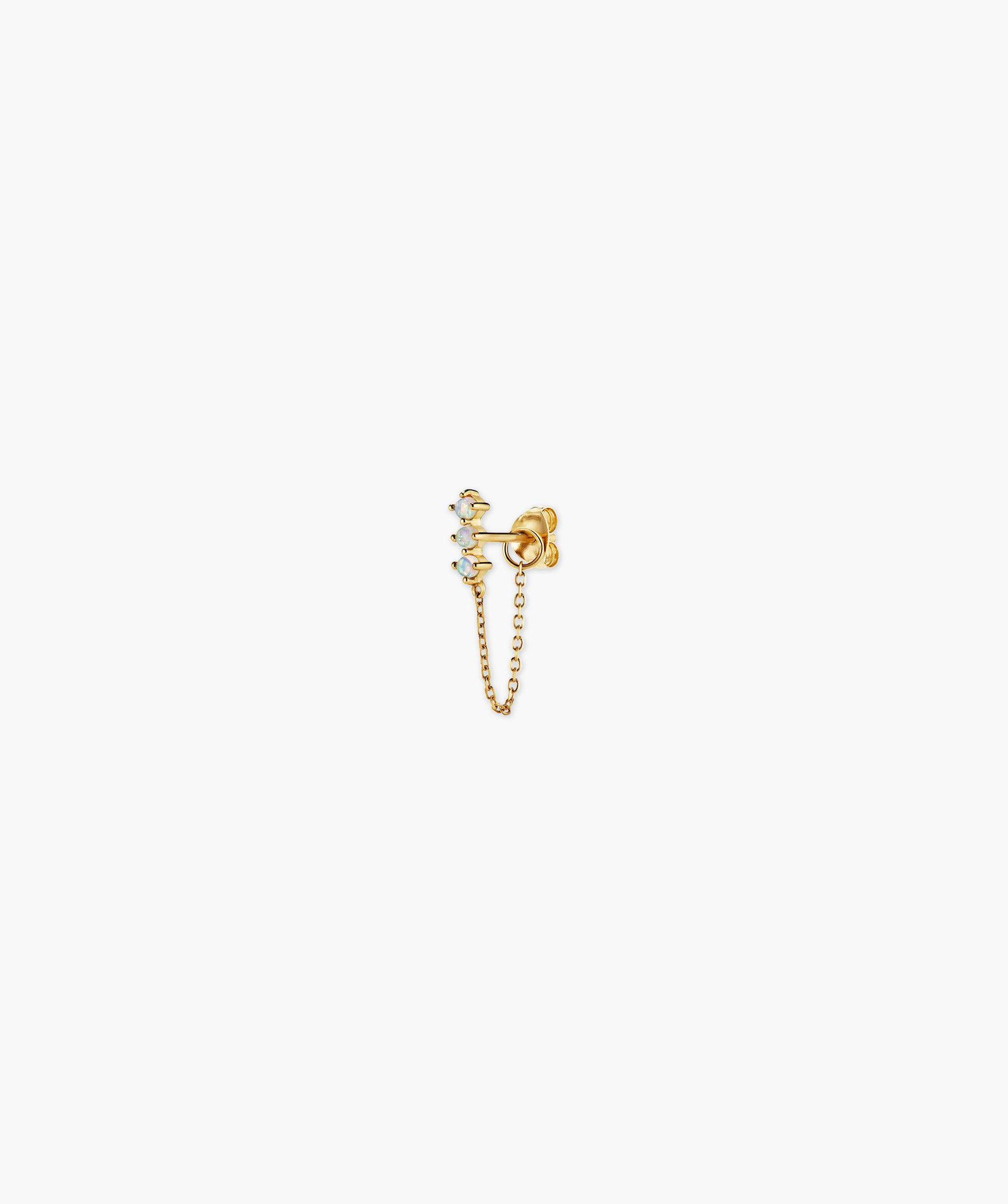 Trio Chain Stud earring featuring three opal gemstones vertically aligned, with a fine-link chain connecting the stud to the butterfly clasp for versatile styling.
