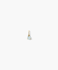 Close-up of a handcrafted 14k gold Birthstone Charm earring featuring a sparkling diamond.