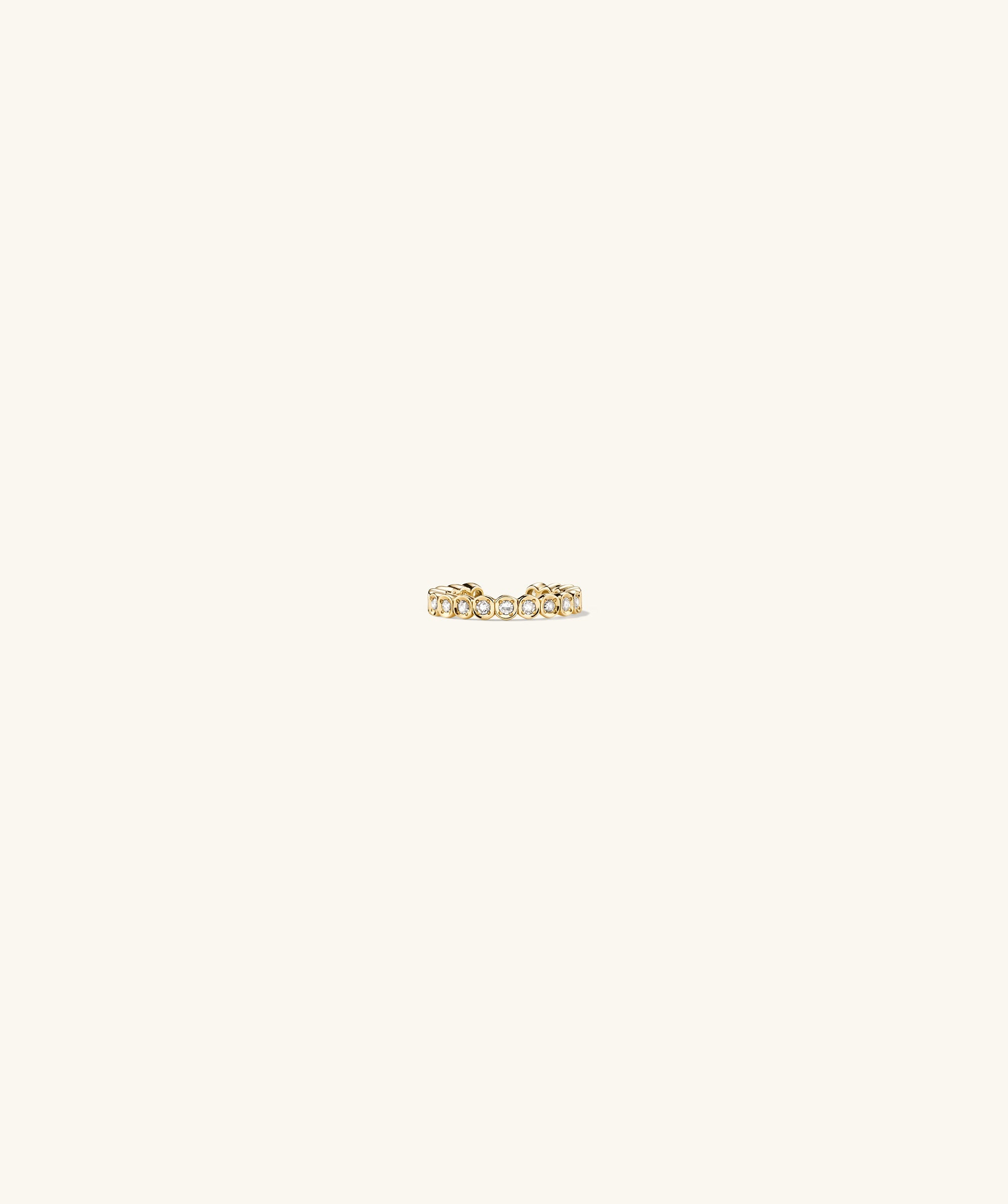 Diamond Ear Cuff: A 14k solid gold ring adorned with small, responsibly sourced diamonds. No piercing needed; simply slip on for a sparkling look.