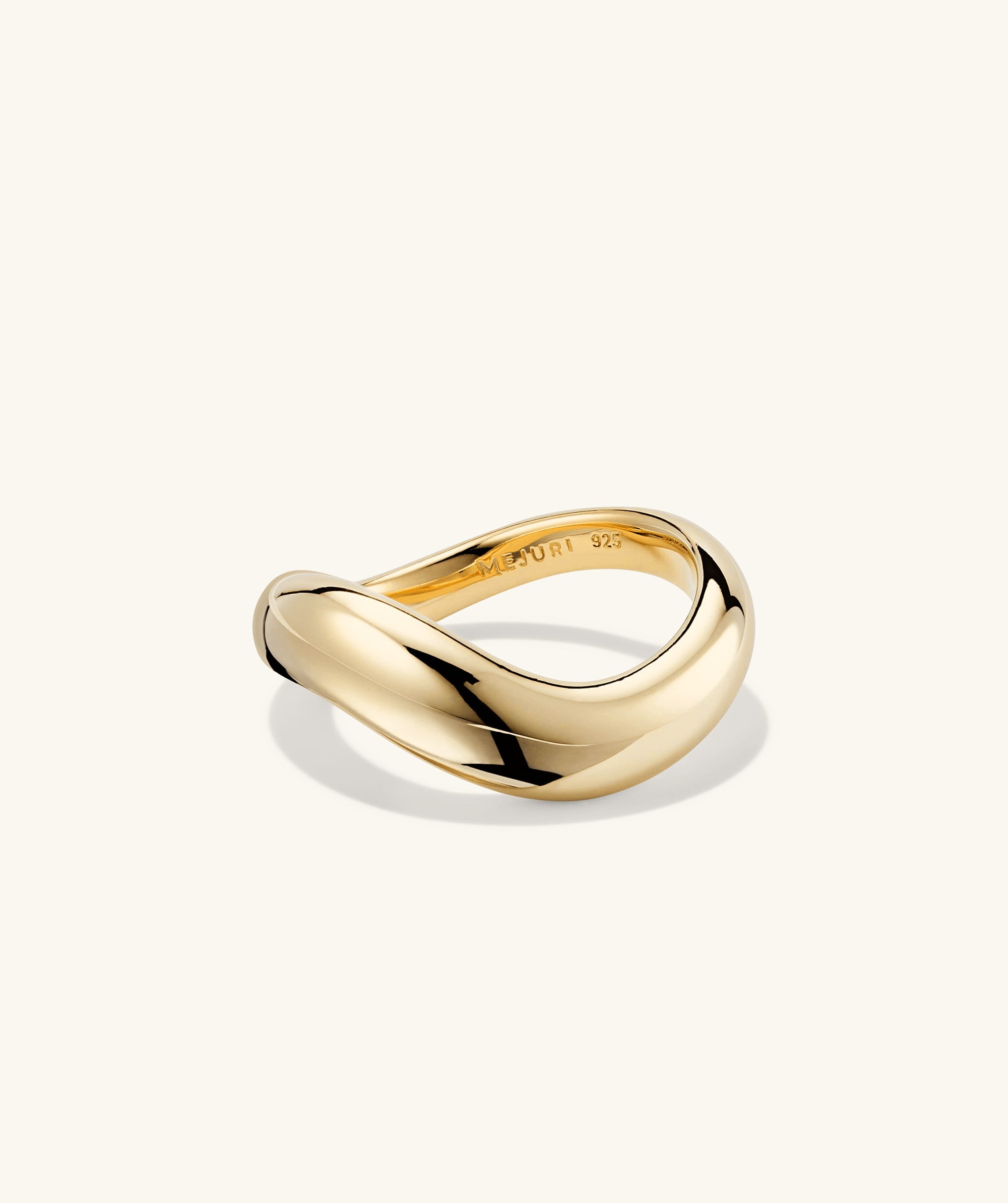 DÃ´me Figure Ring with a curved design, showcasing unique angles, inspired by slow, intentional movement.