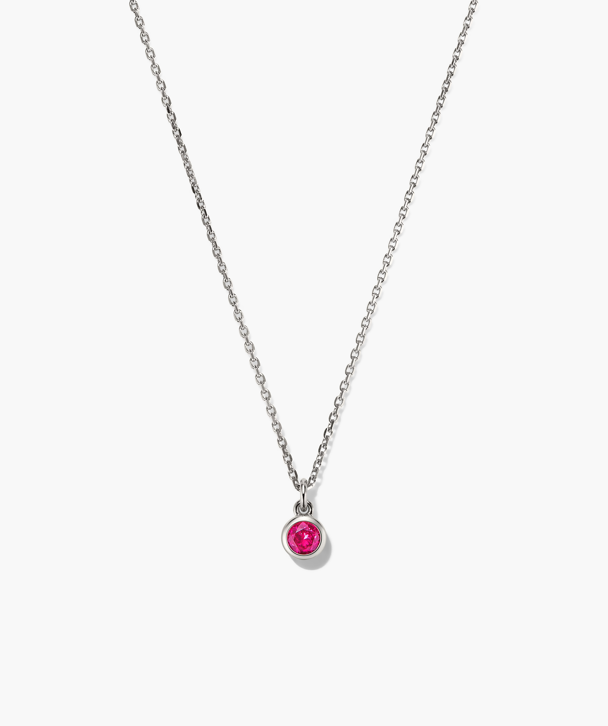 Sia Birthstone Pendant Necklace featuring a sparkling pink gemstone on a silver chain, perfect for personalizing your style or gifting a zodiac enthusiast.