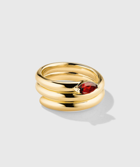 Boa Gemstone Coil Ring: Handcrafted 18k gold vermeil ring featuring a prominent red gemstone, designed to make a bold statement.