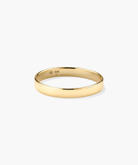 Bold Stacker: A polished 10-karat yellow gold band with a 10K stamp inside, perfect for daily wear and pairing with other Stacker rings.