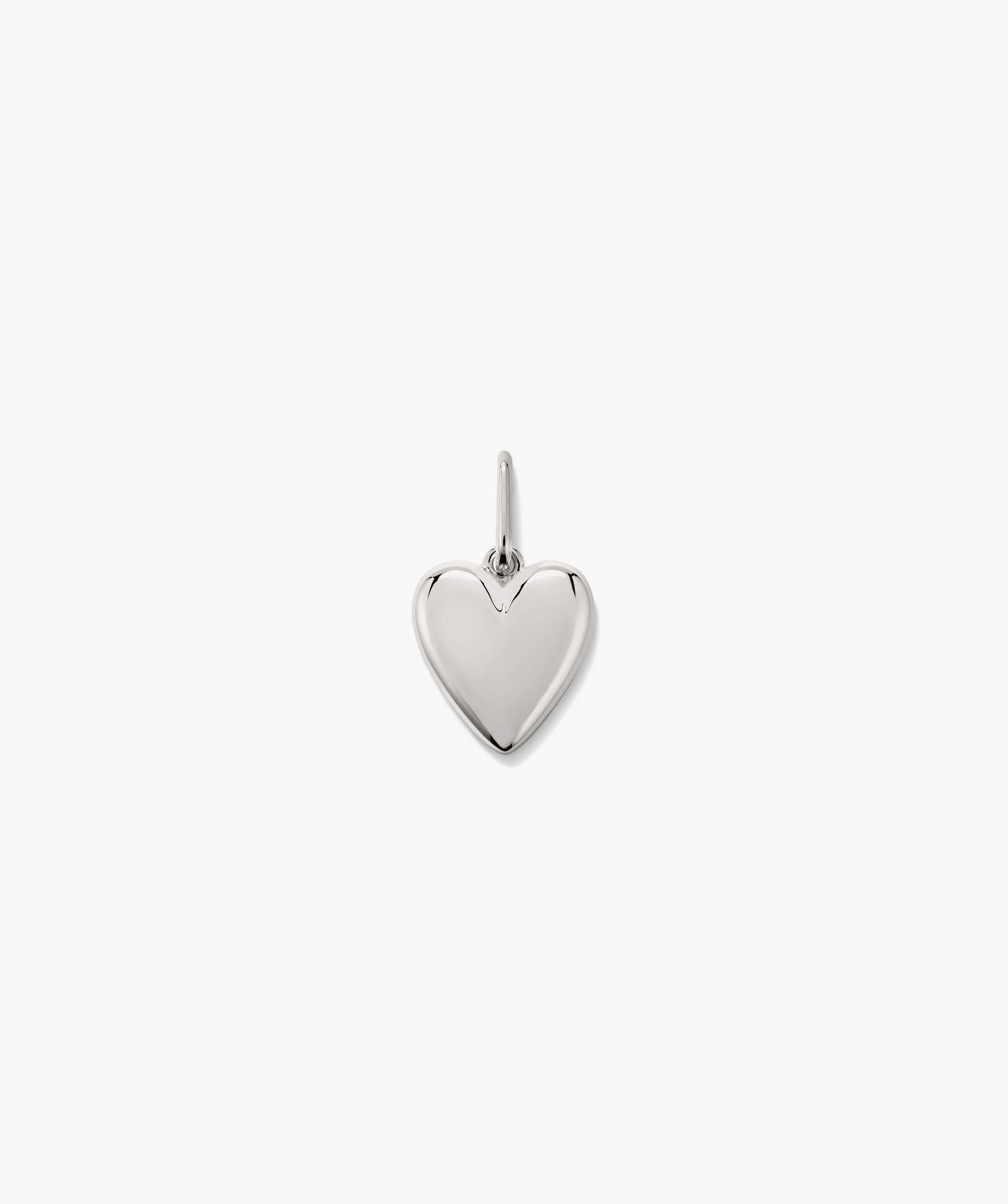 Puffy Heart Charm: A silver heart-shaped pendant, perfect for adding to a bracelet or necklace to celebrate your loves.