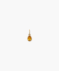Close-up of the Small Pear Pendant, showcasing its elegant shape and shine, perfect for adding a fresh touch to everyday jewelry.