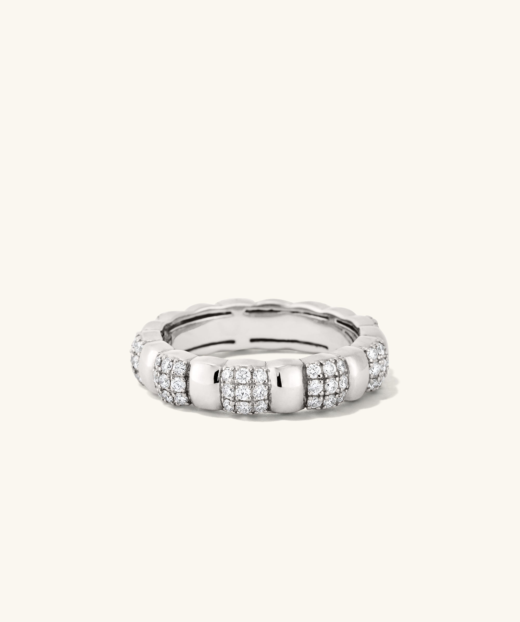 PavÃ© Diamond Soft Charlotte Ring, featuring a silver band encrusted with diamonds in alternating cushions, handcrafted in 14k solid gold with 72 diamonds.