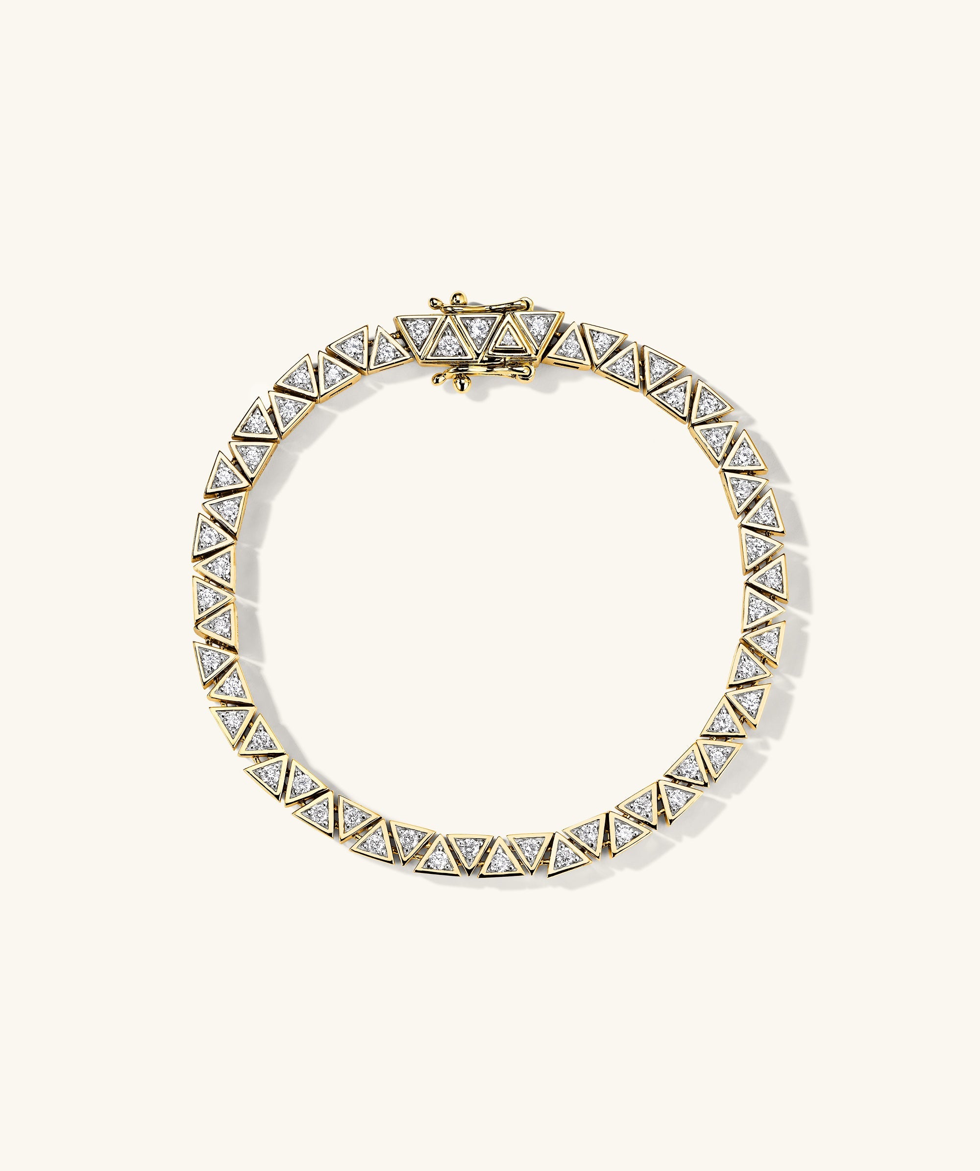 Patra Diamond Tennis Bracelet: A close-up of a handcrafted gold bracelet adorned with responsibly sourced diamonds, perfect for making power statements.