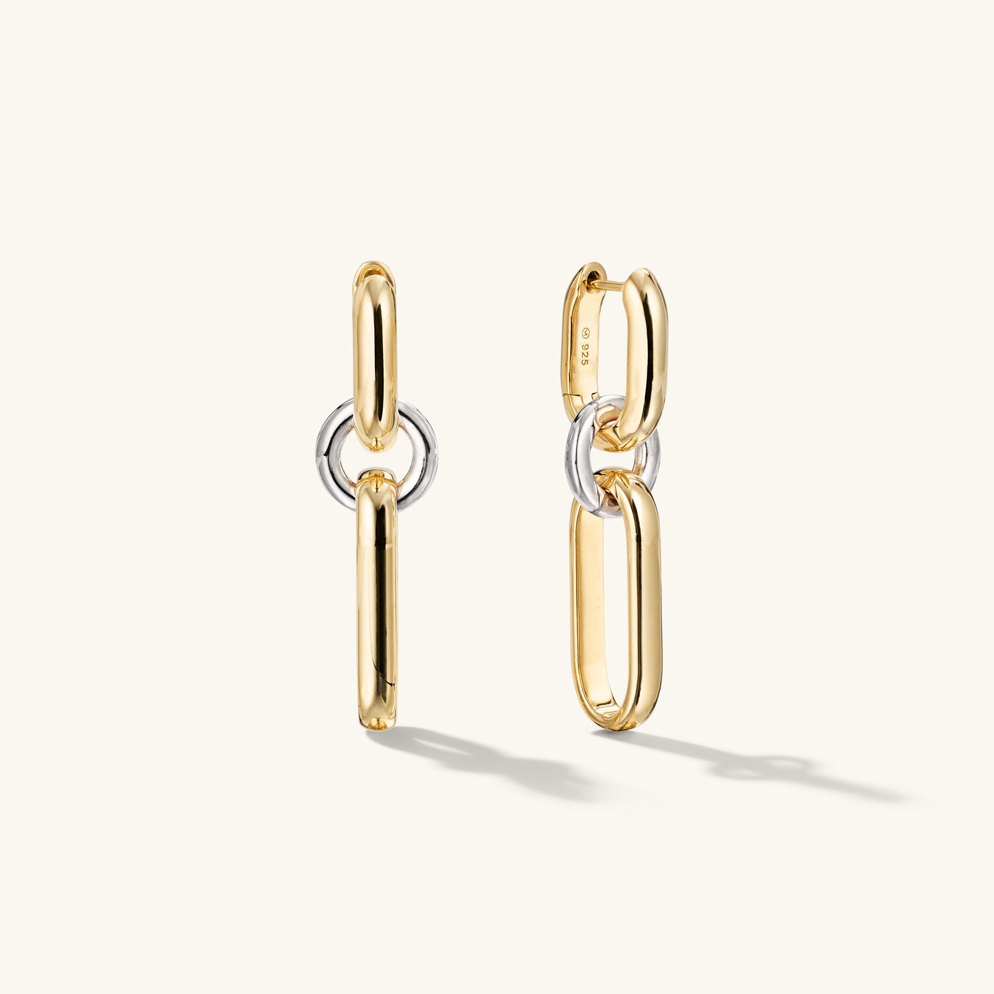 Mixed Convertible Link Earrings in 18k gold vermeil and sterling silver, showcasing duality with versatile styling as huggies or drop earrings.