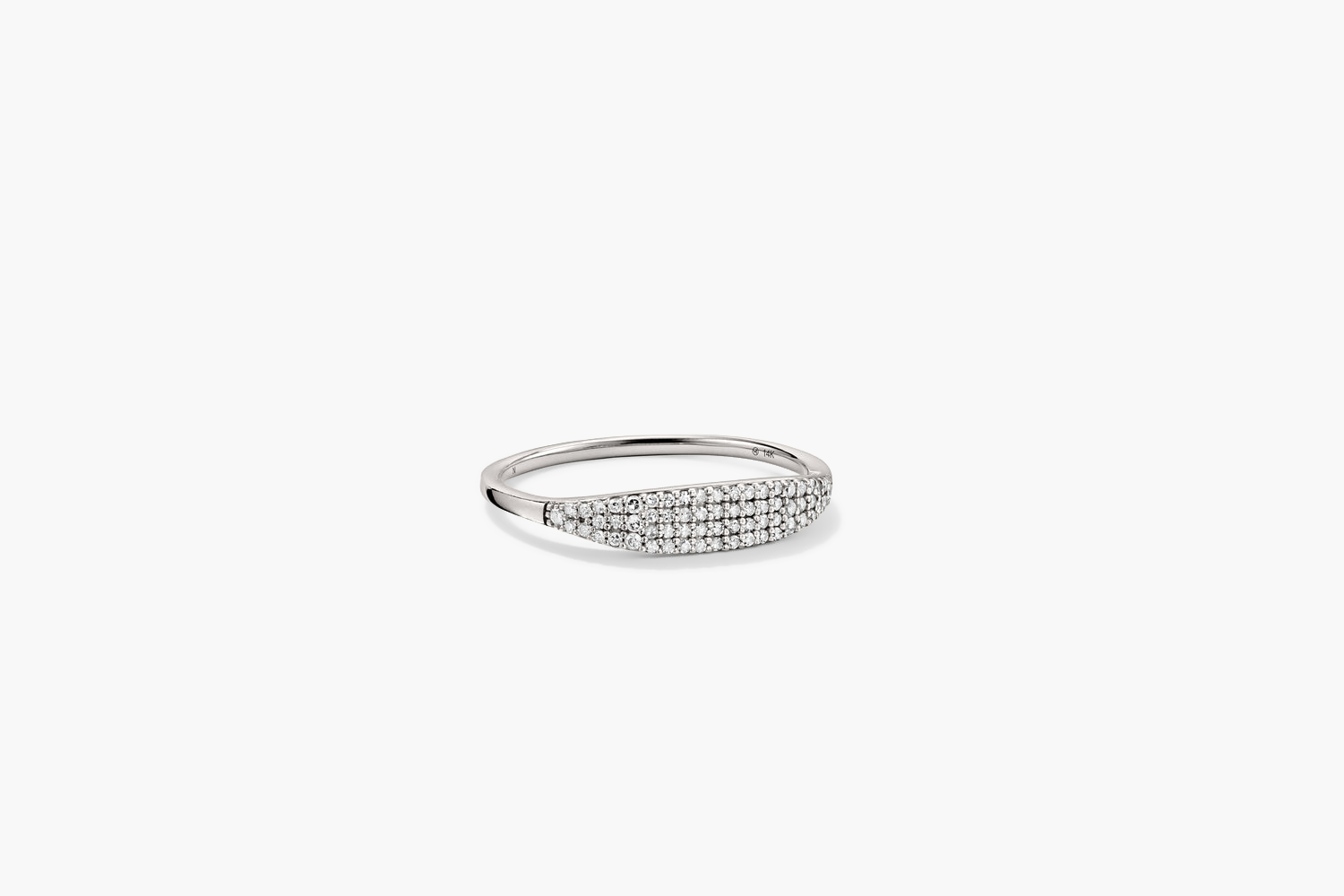 PavÃ© Diamond Slim Signet: A sleek silver ring adorned with sparkling diamonds, offering a stunning, low commitment sparkle for any occasion.