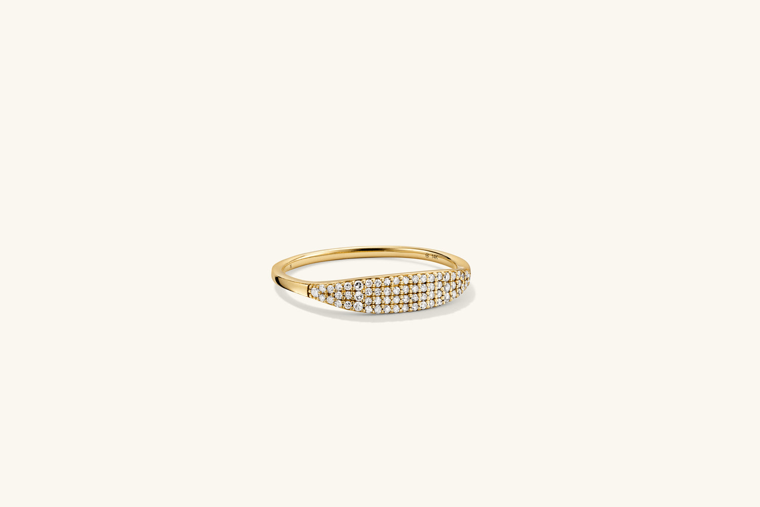 PavÃ© Diamond Slim Signet: A gold ring featuring a sleek signet design adorned with pavÃ© diamonds, offering a subtle yet stunning sparkle.