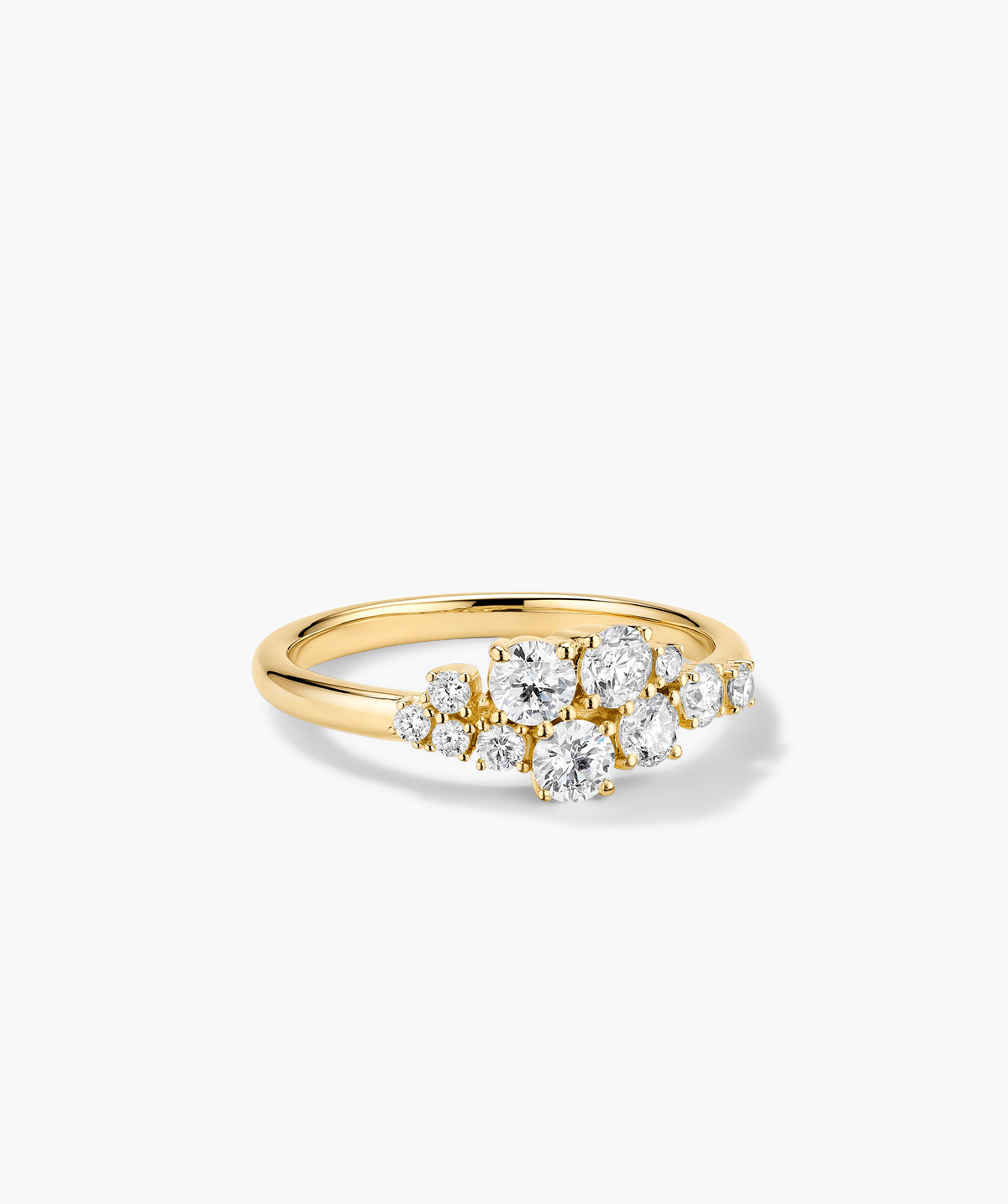Diamonds Cluster Ring featuring an asymmetric design with eleven diamonds in prong settings, showcased in a close-up view highlighting its intricate details and craftsmanship.