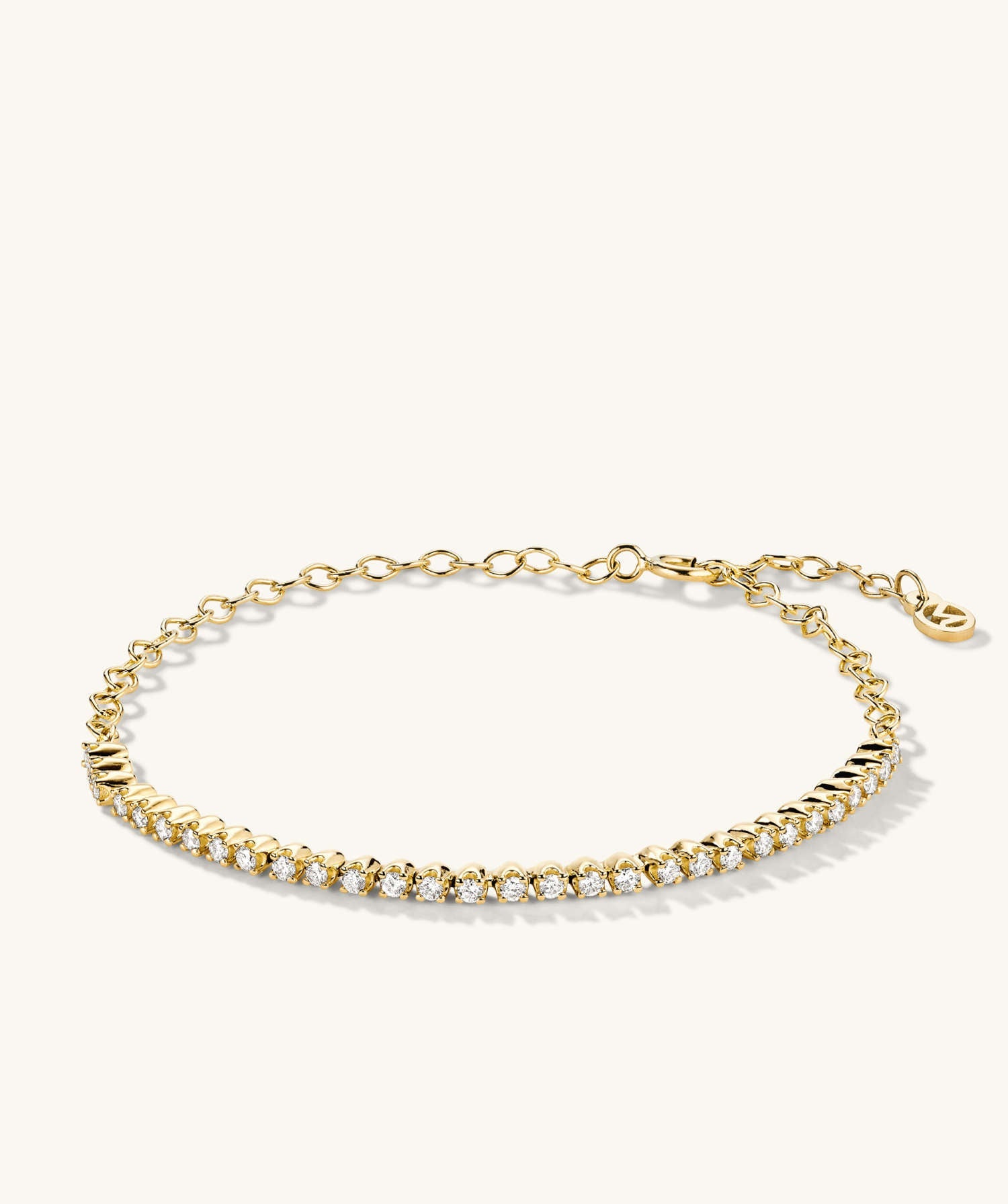 Diamond Half Tennis Bracelet crafted in 14k solid gold, adorned with multiple sparkling, responsibly sourced diamonds, showcasing exquisite handcrafted details.
