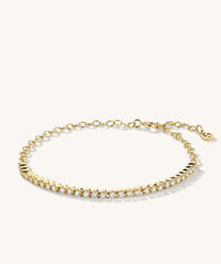 Diamond Half Tennis Bracelet crafted in 14k solid gold, adorned with multiple sparkling, responsibly sourced diamonds, showcasing exquisite handcrafted details.