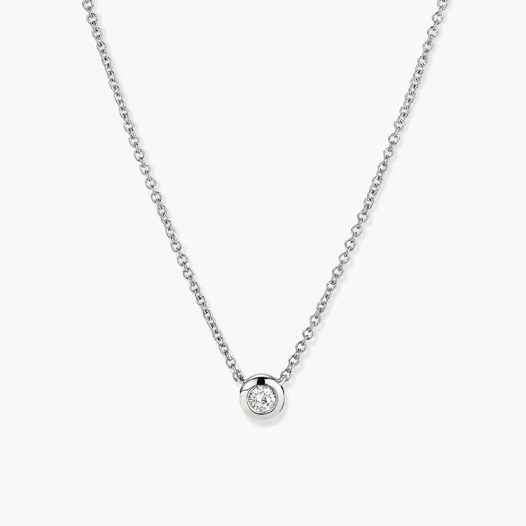 Diamond Necklace: A 14k solid gold chain with a round cut, bezel-set, responsibly sourced diamond pendant.