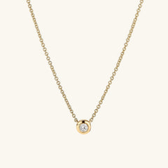 Diamond Necklace featuring a 14k solid gold chain and a round cut, bezel-set, responsibly sourced diamond pendant. Perfect for timeless elegance and lasting quality.